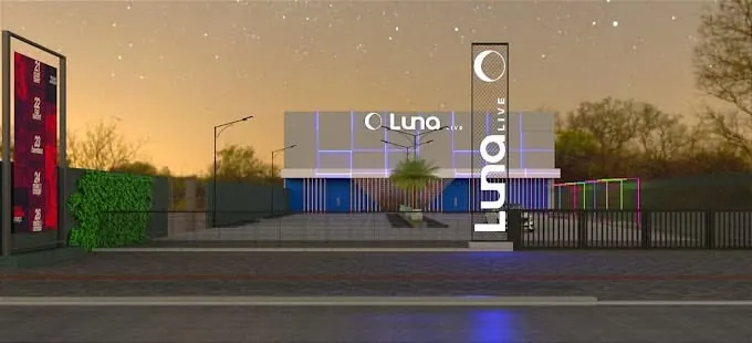 Fachada da Luna Live à noite, com totem e letreiro iluminado, na Av. Cel. Procópio Gomes, Centro de Joinville
